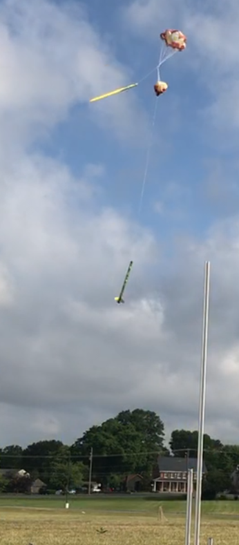 Rocket with one fully deployed chute, and one partially deployed chute
